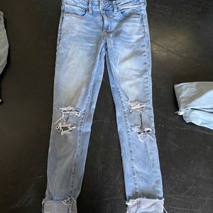 ripped light denim jeans